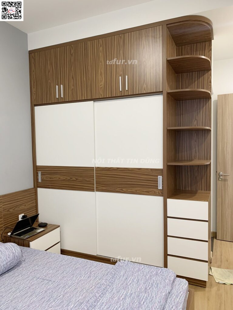 Lavita Charm – Lam gỗ óc chó và sofa xanh ngọc