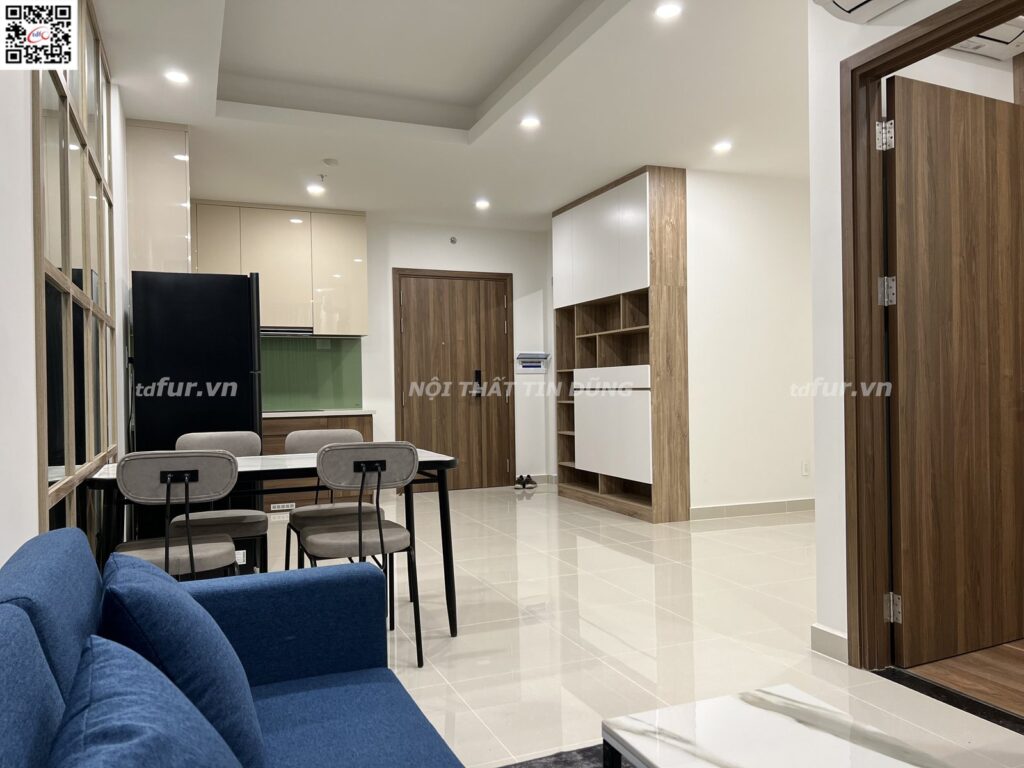 Q7 Saigon Riverside – Sofa xanh dương và gỗ óc chó
