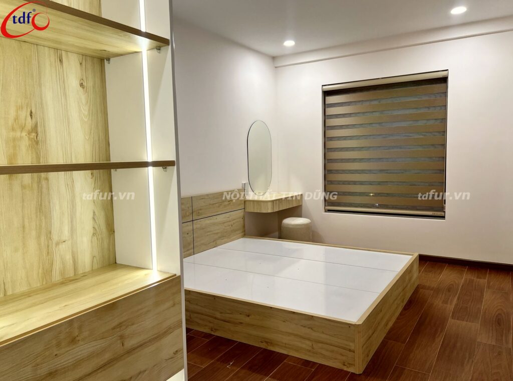 Vũng Tàu Centre Point – Kệ gỗ sáng đèn hắt